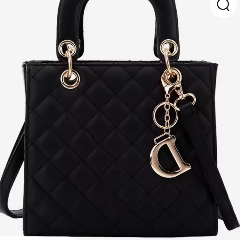 Elegant Black Quilted Satchel with Gold Details